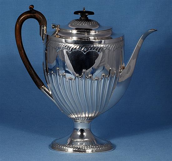 A Victorian demi fluted silver pedestal coffee pot,